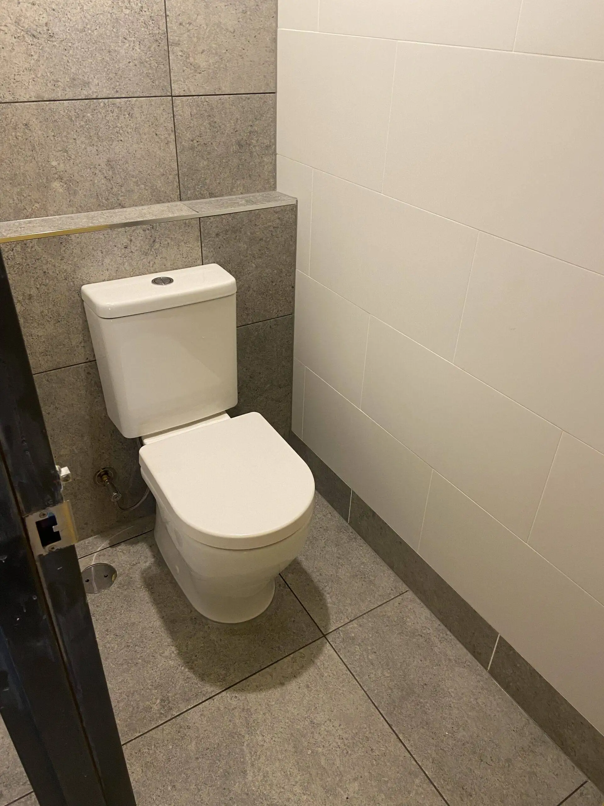 Newly installed modern toilet in Brisbane bathroom renovation