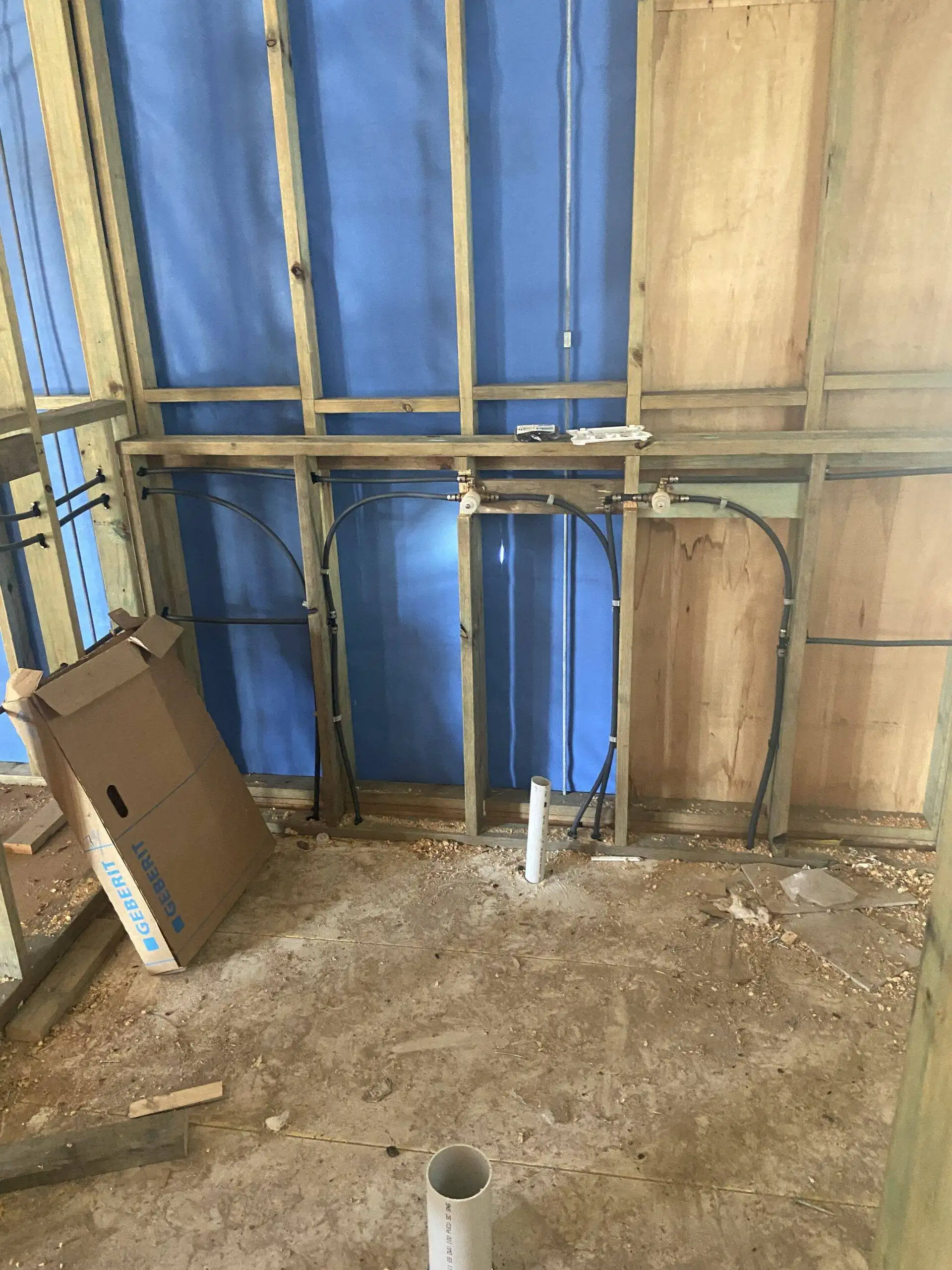 Bathroom plumbing rough-in during Brisbane home renovation